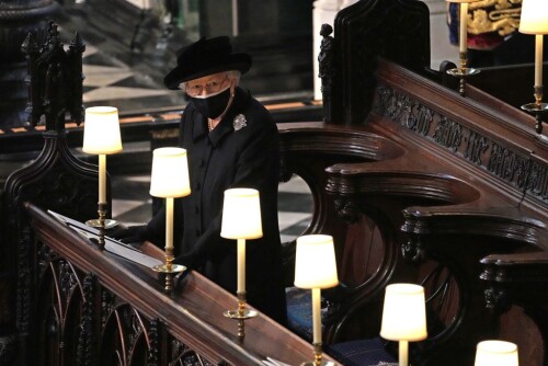 Almost 100 years after he entered the world on a dining room table in Corfu, Prince Philip's final journey began at 14.38 BST on a chilly spring afternoon in the English town of Windsor.

The Duke of Edinburgh's coffin, covered with his Personal Standard, is carried to the purpose built Land Rover Defender ahead of the funeral of the Duke of Edinburgh in Windsor Castle, Berkshire. Picture date: Saturday April 17, 2021

The Duke of Edinburgh's coffin, covered with His Royal Highness's Personal Standard is carried to the purpose built Land Rover during the funeral of Prince Philip, Duke of Edinburgh at Windsor Castle on April 17, 2021 in Windsor, England.

The duke's coffin was carried by Grenadier Guardsmen from the inner hall of Windsor Castle onto a green Land Rover, waiting outside.

The Duke of Edinburgh's coffin, covered with His Royal Highness's Personal Standard is carried to the purpose built Land Rover during the funeral of Prince Philip, Duke of Edinburgh at Windsor Castle on April 17, 2021

The vehicle - built in 2003 in the West Midlands town of Solihull - was designed by the duke himself.

The coffin was draped with the duke's personal standard, with flowers chosen by the Queen and the duke's Admiral of the Fleet Naval Cap and sword, pointing forwards.

The grounds of Windsor Castle

As the military band in the castle grounds played the national anthem, the Queen - wearing a face mask - made her way from the Sovereign's Entrance of the castle to the State Bentley.

Queen Elizabeth II during the funeral of Prince Philip, Duke of Edinburgh at Windsor Castle on April 17, 2021 in Windsor, England.

Under bright blue skies, the eight-minute procession then began, led by Prince Charles and Princess Anne, the duke's two eldest children.

Queen Elizabeth in the Bentley State Limousine and members of the Royal Family follow the hearse during the funeral of Britain's Prince Philip, who died at the age of 99, on the grounds of Windsor Castle in Windsor, Britain, April 17, 2021.

Princess Anne, Princess Royal, Prince Charles, Prince of Wales, Prince Andrew, Duke of York, Prince Edward, Earl of Wessex, Prince William, Duke of Cambridge, Peter Phillips, Prince Harry, Duke of Sussex, Earl of Snowdon David Armstrong-Jones and Vice-Admiral Sir Timothy Laurence follow Prince Philip, Duke of Edinburgh's coffin during the Ceremonial Procession during the funeral of Prince Philip, Duke of Edinburgh at Windsor Castle on April 17, 2021 in Windsor, England.

Princess Anne, Princess Royal, follows the coffin during the ceremonial funeral procession of Britain's Prince Philip, Duke of Edinburgh to St George's Chapel in Windsor Castle, London, on April 17, 2021.

Princess Anne, Princess Royal, Prince Charles, Prince of Wales, Prince Andrew, Duke of York, Prince Edward, Earl of Wessex, Prince William, Duke of Cambridge, Peter Phillips, Prince Harry, Duke of Sussex, Earl of Snowdon David Armstrong-Jones and Vice-Admiral Sir Timothy Laurence follow Prince Philip, Duke of Edinburgh's coffin during the Ceremonial Procession during the funeral of Prince Philip, Duke of Edinburgh at Windsor Castle on April 17, 2021

Members of the Royal family follow Prince Philip, Duke of Edinburgh's coffin during the Ceremonial Procession during the funeral of Prince Philip, Duke of Edinburgh at Windsor Castle on April 17, 2021 in Windsor, England.

The Prince of Wales walks behind The Duke of Edinburgh's coffin, covered with His Royal Highness's Personal Standard, outside St George's Chapel, Windsor Castle, Berkshire, before the funeral of the Duke of Edinburgh. April 17, 2021.

Princes William and Harry were either side of their cousin, Peter Phillips. The State Bentley followed behind - the Queen, for once, behind her husband, rather than two steps in front.

Prince William, Duke of Cambridge, (L) and Britain's Prince Harry, Duke of Sussex follow the coffin during the ceremonial funeral procession of Prince Philip, Duke of Edinburgh to St George's Chapel in Windsor Castle in Windsor, on April 17, 2021.

Before the coffin entered St George's Chapel, a minute's silence was held - both in the castle and around the country.

The Duke of Edinburgh's coffin, covered with his Personal Standard, is carried into St George's Chapel, Windsor Castle, Berkshire, ahead of the funeral of the Duke of Edinburgh

The Duke of Edinburgh's coffin, covered with his Personal Standard, is carried into St George's Chapel, Windsor Castle, Berkshire, ahead of the funeral of the Duke of Edinburgh. April 17, 2021.

And then, step by step, Royal Marines took the coffin into the chapel, followed by the duke's family - all of them, by now, wearing black masks.

The Duke of Edinburgh's coffin, covered with His Royal Highness's Personal Standard is carried into St George's Chapel, Windsor Castle, Berkshire, during the funeral of the Duke of Edinburgh.

Members of the royal family follow the coffin into St George's Chapel

As the coffin was carried into the chapel, illuminated by shafts of light from the stained glass windows, the choir sang, and the Dean of Windsor began the service.

Pall Bearers carrying the coffin of the Duke of Edinburgh, followed by (left to right, first row) the Prince of Wales, Princess Anne, ((left to right, second row) the Duke of York, the Earl of Wessex, ((left to right, third row) the Duke of Cambridge, Peter Phillips, (left to right, fourth row) the Duke of Sussex, the Earl of Snowdon and (back) Vice Admiral Sir Timothy Laurence, entering St George's Chapel, Windsor Castle, Berkshire. April 17, 2021.

The BBC's Eleanor Oldroyd was the only reporter or broadcaster inside the chapel - she was in a small, specially-built studio above the high altar.

"Doing something inside the chapel is very special, it's a very unique position, and it's a very responsible position as well," she says. "It's a moving time for a lot of people."

Members of the royal family follow the coffin into St George's Chapel during the funeral of the Duke of Edinburgh, at Windsor Castle, Berkshire.

Queen Elizabeth II (L) watches as pallbearers carry the coffin of Britain's Prince Philip, Duke of Edinburgh during his funeral inside St George's Chapel in Windsor Castle in Windsor, west of London, on April 17, 2021.

"There was one moment when I just saw the Duke of York, sitting two seats along from the Queen, just turn to her and check - just as if he was checking that she was OK," says Ms Oldroyd.

"I don't know whether that's what he was doing, but it felt to me a little moment of concern to mother from son."

The coffin is carried into St George's Chapel during the funeral of Britain's Prince Philip, who died at the age of 99, at Windsor Castle, Britain, April 17, 2021.

Queen Elizabeth II takes her seat for the funeral of Britain's Prince Philip, who died at the age of 99, at St George's Chapel, in Windsor.

The Duke and Duchess of Cambridge, with the Earl of Wessex at the funeral of the Duke of Edinburgh

The coffin is carried into St George's Chapel during the funeral of Britain's Prince Philip, who died at the age of 99, at Windsor Castle, Britain, April 17, 2021.

At 15.42, the coffin was lowered into the Royal Vault. "A real moment of drama and theatre, but also a very moving moment," says Ms Oldroyd. The duke's final journey had ended.

And then, as the Queen stood alone, the choir sang the national anthem.

Queen Elizabeth II during the funeral of the Duke of Edinburgh in St George's Chapel, Windsor Castle, Berkshire.

Members of the Royal family attend the funeral service of Britain's Prince Philip, Duke of Edinburgh inside St George's Chapel in Windsor Castle in Windsor

The coffin of the Duke of Edinburgh during his funeral at St George's Chapel, Windsor Castle, Berkshire

Two minutes later, the funeral finished and the guests left the chapel. The duke was in his resting place and his epic, international adventure - which began on a Greek island in 1921 - was over.