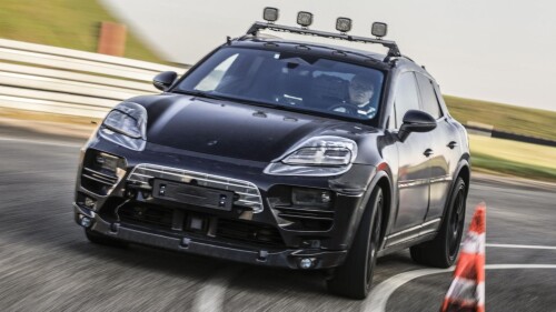 Official: Porsche is building a fully electric Macan, due in 2023. And it'll 'drive, look and feel like a Porsche'. Here's your first look!

Porsche will launch its all-new all-electric Macan in 2023. Prototypes have begun testing on public roads. Before launch they’ll do two million miles. Michael Steiner, Porsche’s engineering director, has been telling TopGear.com about the car.

Of the styling, he says: “It will look like a typical Porsche and fulfil your expectations of an electric vehicle. It is a typical Macan but much more modern and sporting.”

The deliberate-leak shots show a car with a wedgy bonnet line, sitting lower than the headlamps. It can pull that 911-alike trick because there’s no engine underneath. The lamps themselves are shallow, like the Taycan’s. Like that shovel nose, a tapered fastback is obviously going to be good for aero.

Ignore the false chrome window line at the back. That’s just disguise. So are the fat rear bumper and – durr – fake exhaust tips.

We ask about specs, but he prefers to talk first in impressions. “It will drive like a Porsche. It will look like a Porsche, feel like a Porsche and it will have the soul of a Porsche.”

More specifically, he says: “It will have everything the current Macan has for performance technology and in addition high-end electric technology from the Taycan.” A helpful engineering drawing shows the four-wheel-drive and air springs. With low-mounted batteries, you’ve got to expect the E Macan is going to deliver in corners.

E Macan is the working name, Steiner says. They haven’t settled on the production badge. But it will be Macan-sized and not much more than Macan-priced.

It doesn’t use a combustion-car platform, nor the Taycan’s J1 platform or the VW Group’s MEB. It has a new electric platform called PPE that will be shared with the Audi A6 e-tron and others. He says Audi and Porsche both contributed their best attributes. “From our side that is the best genes for a sports car, and fast charging.”

Steiner confirms it will use 800V electrics, as with the Taycan. This allows ultra-fast charging – more than the Taycan’s 270kW. It also means high levels of regenerative braking for better efficiency when speeds rise and fall. In other words when you’re driving it like a Porsche, not steady-speed cruising the highways.

Audi has said the battery capacities of its PPE cars go up to 100kWh, and Steiner confirms Porsche shares that.

Of course there won’t be just one battery or power version. “We will have a typical Porsche spread of models, including a high-end super-performance variant [doubtless called Turbo]. Down the range, for efficiency, two-wheel-drive is worth a thought.”

So I ask how big the battery capacity and range might eventually get. Or will there be a sweet spot as chargers get closer together and more powerful? “It will be different for different car brands. At Porsche, weight plays a major role. It’s not the answer to add kilograms for range. Our main target is to reduce weight and charge times from our present 20 minutes. We are convinced that highway infrastructure should be improved. We plan to increase range slightly but we’re not aiming for the world championship.”

Big batteries also mean the car is carrying loads of lithium that its owner will seldom actually use. He says this takes more energy in mining, and makes the car less efficient, so the CO2 break-even point in its lifecycle, versus a petrol car, will be further away.

The original Macan remains Porsche’s biggest seller. It might not feel old, but it is – it has been around since 2013. So, says Steiner, “before the electric Macan in 2023 we will invest in updating the existing one”.

That facelift Macan will then sell side by side with the electric one. “So customers and regulators can choose. We do not know how fast the switchover will happen in different regions.”

There won’t be a PHEV version of the revised combustion Macan. That’s just for the Cayenne and Panamera, says Steiner. Across the Porsche range, half of Porsche’s sales will be EV or PHEV by 2025, he adds. Given the 911 and 718 have no mains cable, it means a very high proportion of the four-doors and SUVs will be PHEV (Panamera and Cayenne) or EV (Taycan and Macan).

This should add business, says Steiner. “More than half of Taycan customers are new to the brand. But some have a Porsche and have kept it. We are looking forward to the same with the E Macan.”