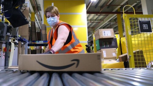 US tech giant Amazon is to go on a hiring spree in the UK as online shopping continues to boom in the pandemic.

Amazon is to hire 10,000 UK employees as it opens more warehouses in the north and south of England.

It is also creating a number of corporate roles in Cambridge, Edinburgh, London and Manchester.

Business Secretary Kwasi Kwarteng said the move was "a huge vote of confidence in the British economy".

The coronavirus pandemic has accelerated a trend towards online shopping, and tech giants such as Amazon have reaped the benefits.

Now the firm, which has come under criticism over working conditions and over the amount of tax it pays, is further entrenching its position in the UK.
The addition of 10,000 new roles, including thousands in its warehouses, will take its UK workforce to more than 55,000 by the end of the year.

Amazon said pay for operations roles was £9.70 per hour, or £10.80 in London, with other benefits.

Its profits tripled in the first three months of the year to $8.1bn (£5.76bn), up from $2.5bn a year ago.

The online retail giant will open new "fulfilment" warehouses in Dartford, Gateshead, Hinckley and Swindon, and a "parcel receive" warehouse in Doncaster.

It will recruit in its offices for roles in fashion, digital marketing, engineering, video production, software development, cloud computing, AI and machine learning.

The company will also be recruiting for its Amazon Web Services (AWS) cloud computing business and its operations network.

Working conditions
Amazon continues to face scrutiny over how much tax it pays in the UK, which prompted the government to launch a digital services tax in April 2020.

The online retail giant has insisted that it pays all taxes required in the UK.

On Thursday, it won a court battle overturning an order for it to pay €250m (£215m) in back taxes to the EU.

In March, the Unite union demanded that Amazon give its British workers a "new deal", including allowing them to unionise and have a greater share of the firm's profits.

At the same time, it also launched a confidential hotline for Amazon workers to call to whistleblow on working conditions.

"Amazon continues to be plagued by reports of poor working conditions and anti-union tactics," said Unite's executive officer Sharon Graham at the time.

"Unite has written to Jeff Bezos to call on him to guarantee workers the freedom to talk with and form a union without fear."

Training 'key'
Business Secretary Kwasi Kwarteng heralded Amazon's plans as making a "prime investment in our retail sector", which will "open up a wide range of opportunities for even more workers".

Amazon will also invest £10m over three years into a scheme to train 5,000 employees in subjects including accountancy, HGV driving and software development, in a bid to give them transferable skills.

Amazon will pay 95% of tuition and associated fees for adult education courses, up to £8,000 over four years.

Local chambers of commerce will work with Amazon to identify regional skills shortages.

Shevaun Haviland, director general of the British Chambers of Commerce, said: "Providing staff with training to plug the skills gaps that exist within the local business community is going to be a key driver to increasing productivity and boosting the economy as the UK recovers from the pandemic."

Amazon's UK Country Manager John Boumphrey said: "We're proud of the front-line roles we offer across Amazon, and we also know that they will be a stepping stone for some in their career journey."