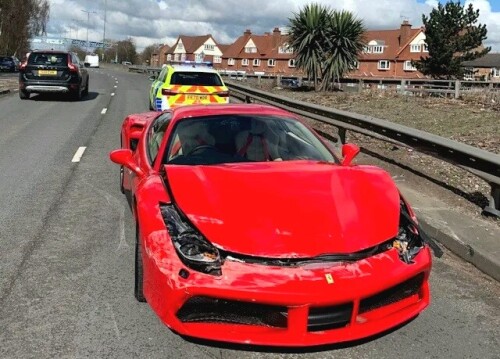 A gutted Ferrari owner crashed his brand new £250,000 supercar after driving it for just two miles.

The driver, who was uninjured, was left counting the cost after his car was involved in the collision shortly after he purchased it in Derby on Friday.

Photos shared by police show the front bonnet crumpled with scratches all across the front of the red sports car.

The luxury motor is believed to be a Ferrari 488.