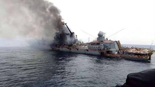 Doomed Moskva Russia warship is 'seen burning in  image posted to twitter' after Ukraine missile strike 'killed ALL 510 aboard' Putin's Black Sea flagship.