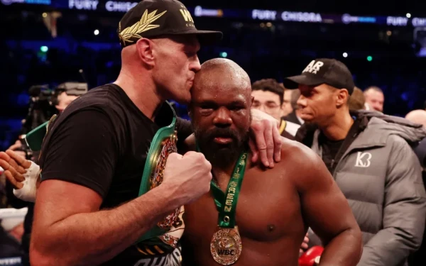 Tyson Fury retained his WBC heavyweight title with a one-sided beatdown of Derek Chisora which ended with a 10th-round stoppage.

It was Fury's third win over his British rival, with referee Victor Loughlin mercifully stepping in to stop the fight – although the end could have come two to three rounds earlier from Chisora's corner.

The Fury Show rumbles on, and in front of 60,000 spectators on a night of chills and thrills, the 'Gypsy King' wasted no time in calling out his rivals for next year, starting with Oleksandr Usyk, who holds the other three heavyweight belts.

The Ukrainian, who has twice beaten Anthony Joshua, was ringside for the bout and Fury beckoned him to a neutral corner of the ring afterwards.

As Usyk climbed up on to the ring Fury ranted at him: "You are next... me and you sucker, next – you're getting it".

Fury described the WBA, WBO and IBF champion as "a 15-stone little midget" and vowed "to write [you] off...I've already beaten one Ukrainian, Klitschko, and I'll do you as well".

Usyk stared back, unmoved, as Fury called him "a little sausage" before turning his attention to Joe Joyce, the undefeated Briton, who Fury suggested he could also fight next year. "If this guy [Usyk] doesn't want to fight, we can meet at Wembley Stadium."

Fury told Telegraph Sport: "I'll fight all of them, I fear none of them. I might need a little surgery on my elbow and arm next year as it has been troubling me a bit, but there is no retiring for me. I'll fight all the heavyweights of the era, and I'll beat them all."

There was also praise for the obdurate Chisora, outclassed and slowly roasted over 10 rounds by the heavy hands of the man proving himself the master of the heavyweights in this era.

"What a tough man. I was hitting him with shots there that would've knocked anyone else spark out but he stood up to all of them," said Fury. "He was calling me a little b---- in there, saying 'you can hit harder than that'."

"I felt good, I needed some rounds as I haven't boxed since April," he added. "I felt like I landed my jab and landed some good punches. But take nothing away from [Chisora] he's an absolute warrior and a British folk hero. It's been a privilege to fight him three times. We all love Derek Chisora."