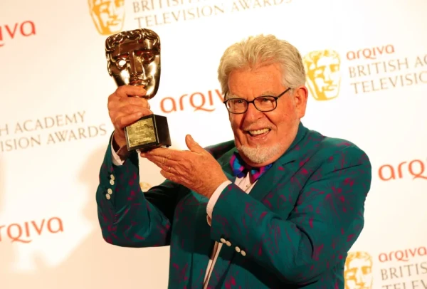 Disgraced entertainer Rolf Harris dies aged 93 of neck cancer and 'frailty of old age'

Rolf Harris has died aged 93 years old, it has been announced.

According to his death certificate, Harris died on Wednesday, May 10 from neck cancer and “frailty of old age” at his home in Bray, Berkshire.

A statement from his family, released through his solicitor, said: “This is to confirm that Rolf Harris recently died peacefully surrounded by family and friends and has now been laid to rest.

“They ask that you respect their privacy. No further comment will be made.”

The once loved Australian entertainer rapidly fell from grace after he was convicted for a sexually abusing children.

His seven-decade career launched in the 1950s, when he left behind his years as a teenage champion swimmer to pursue a life in front of the cameras.

e had hit songs including "Two Little Boys" which reached number one in the UK charts.

Harris moved to England and lived in Berkshire for more than 60 years.

He went on to present multiple children's TV shows and painted an official portrait of her late majesty Queen Elizabeth II in 2005.

As a trusted familiar face, he taught generations of children to swim and draw and even fronted a campaign warning of the dangers of child abuse in 1985.

But away from the camera, he was a sexual predator exploiting his position to abuse his victims.

In the years before his crimes emerged his career powered ahead.

The Australian-born star was awarded an MBE, OBE and CBE and was also presented with a BAFTA fellowship.

During his performance at the 2012 Diamond Jubilee Concert, one of his victims, who was watching at home, decided to go to the police.

It came as the Metropolitan Police-led Operation Yewtree into sexual abuse allegations against paedophile Jimmy Savile and others was about to begin.

Harris' victims felt empowered to come forward.

One of his victims was his daughter's friend, who he had a sexual relationship with for over 16 years.

He wrote to the girl's father in 1997 claiming his actions were from a 'feeling of love and friendship'.

He was convicted on 12 counts of indecent at London’s Southwark Crown Court in June 2014.

During the sentencing, the judge told him his reputation was in ruins and that he had no one else to blame but himself.

Following his conviction, Harris was stripped of his CBE – which he received after painting the Queen’s 80th birthday portrait.

In May 2017 he was formally cleared of four unconnected historical sex offences, which he had denied.

He was released on licence from Stafford Prison after just three years, in 2017. His health began to deteriorate in recent years.

Later the same year, one of the 12 indecent assault convictions was overturned by the Court of Appeal.

Throughout his trial Harris never apologised to his victims. ..................................................................................................................................................................................